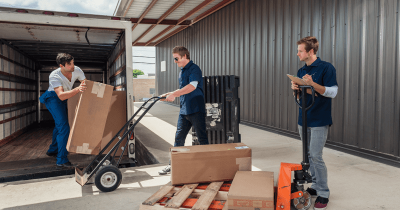 workers loading a semi truck