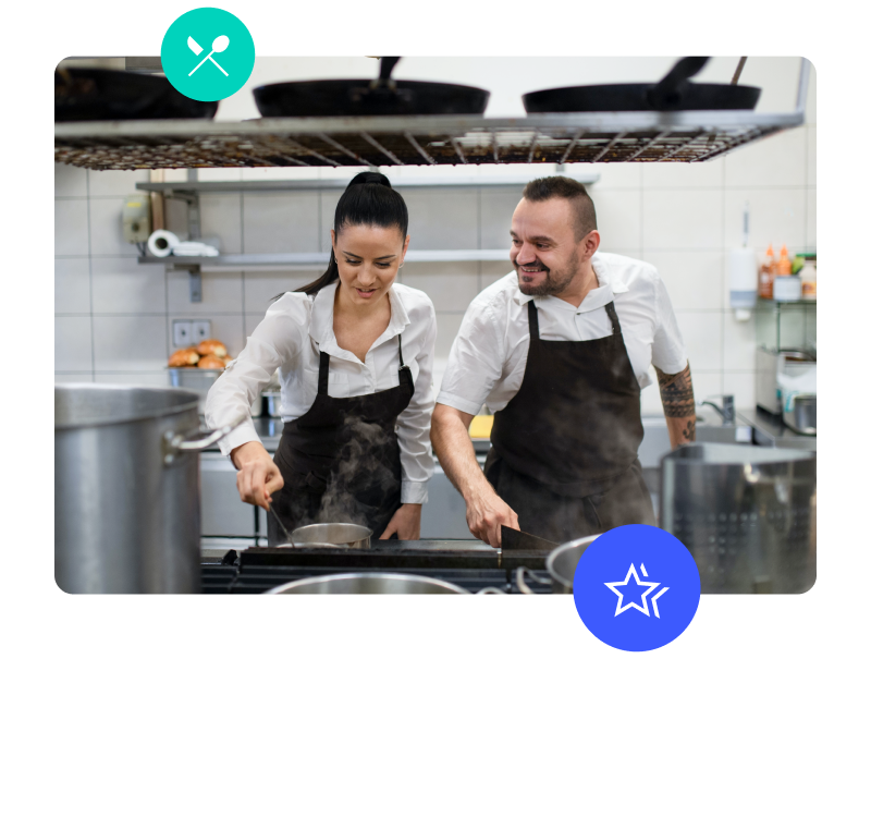 two cooks in a commercial kitchen